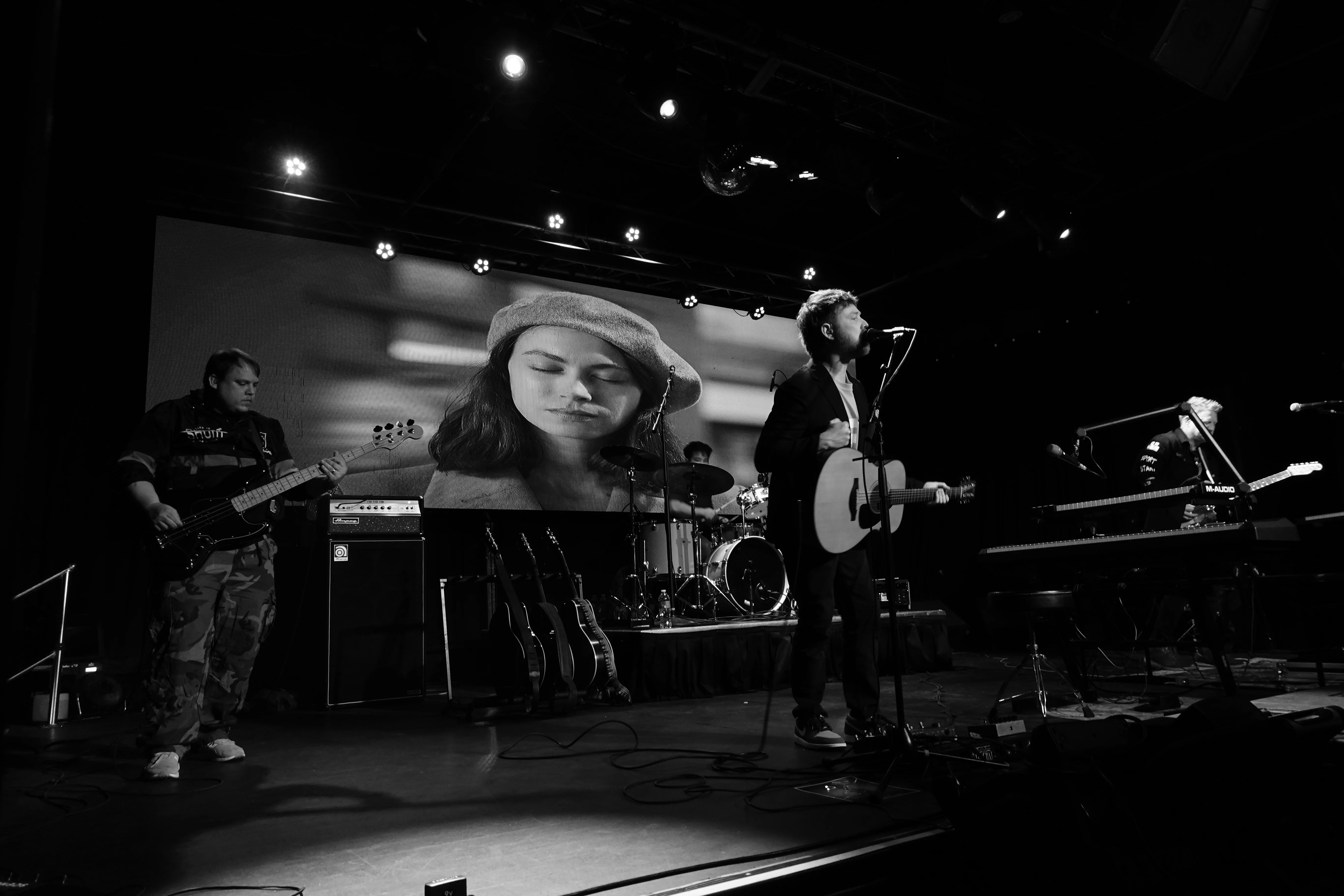 Back To The Start performing together in black and white