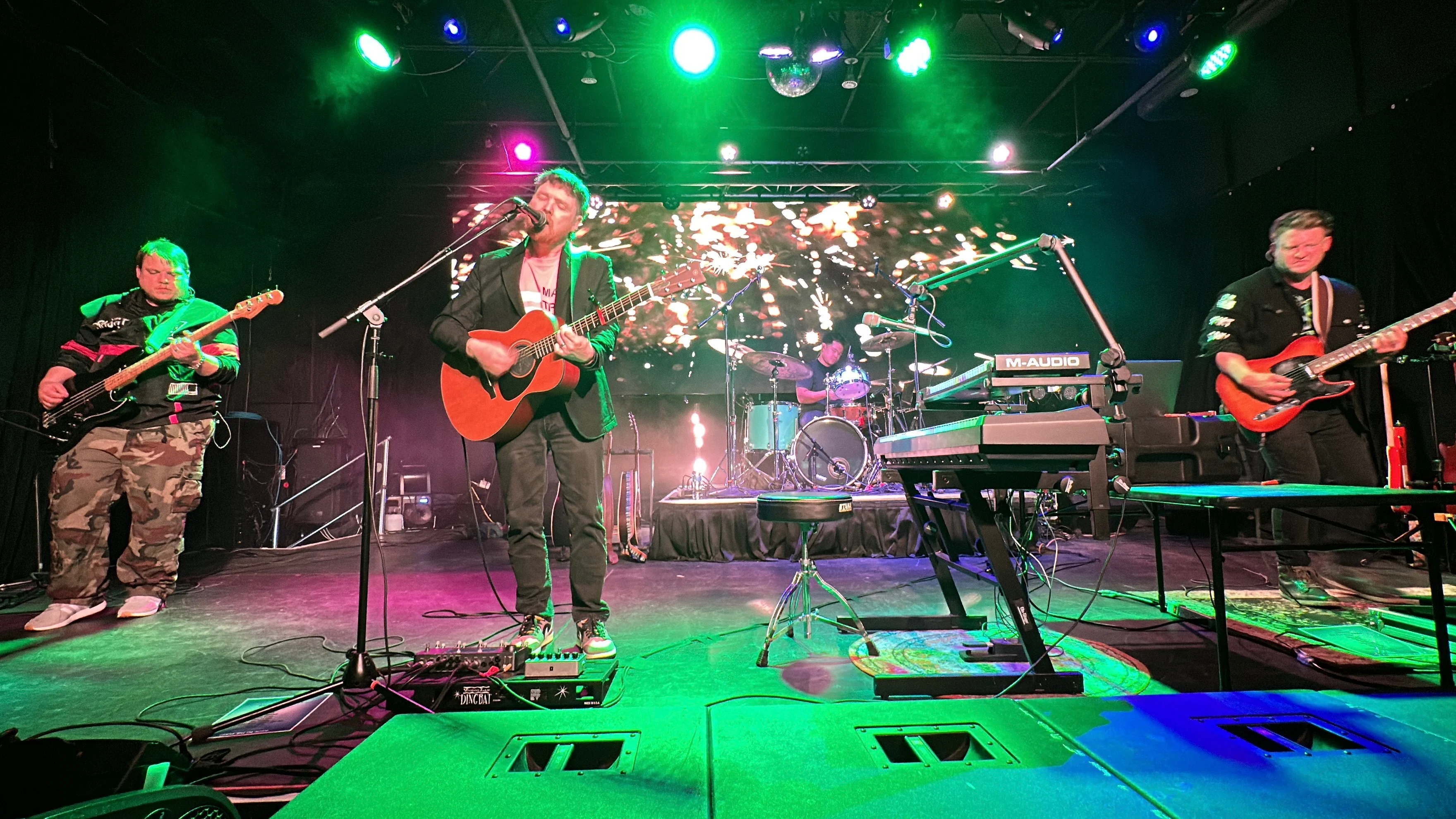 The full band performing live