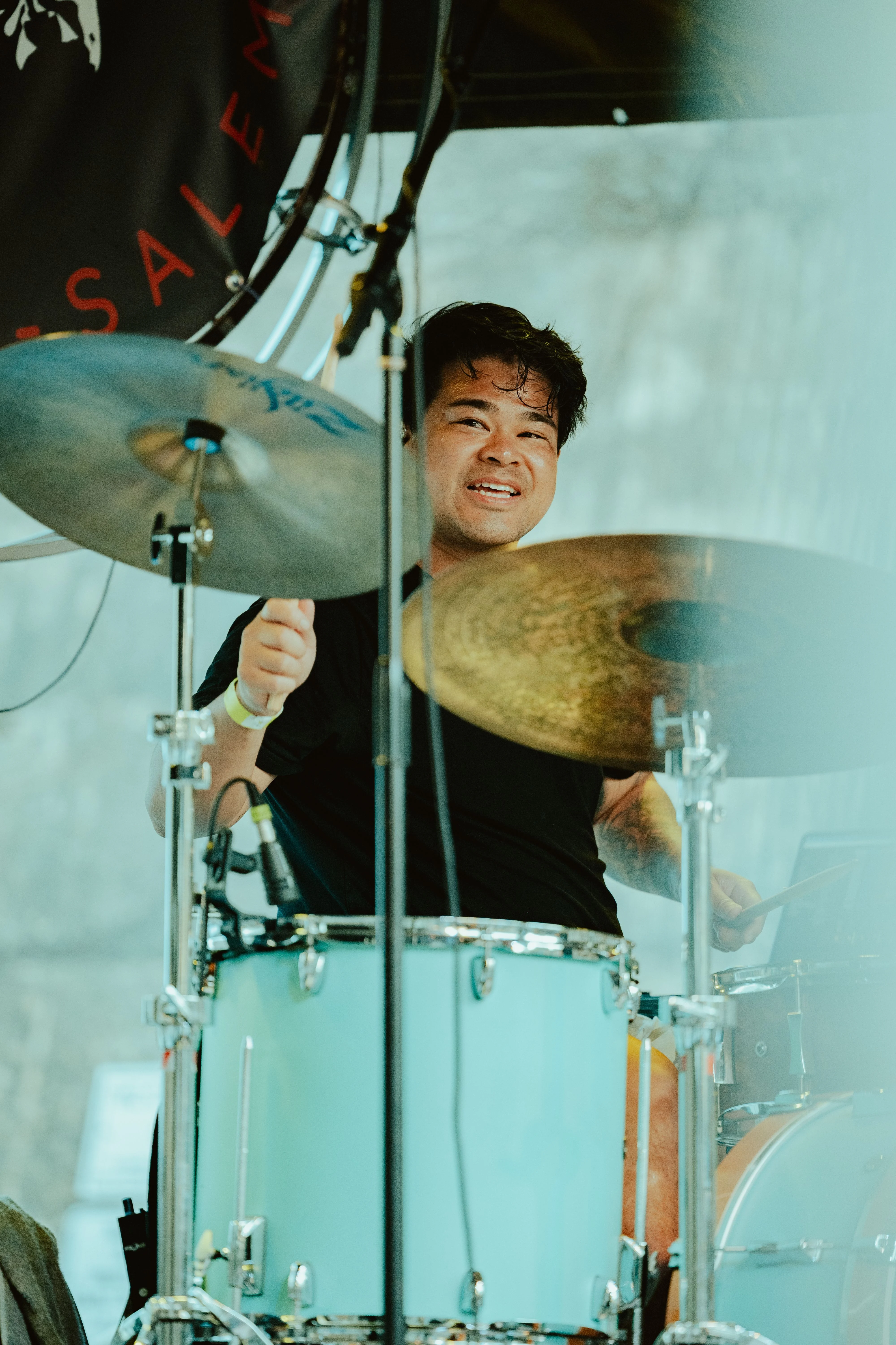 Rod smiling from behind the drums