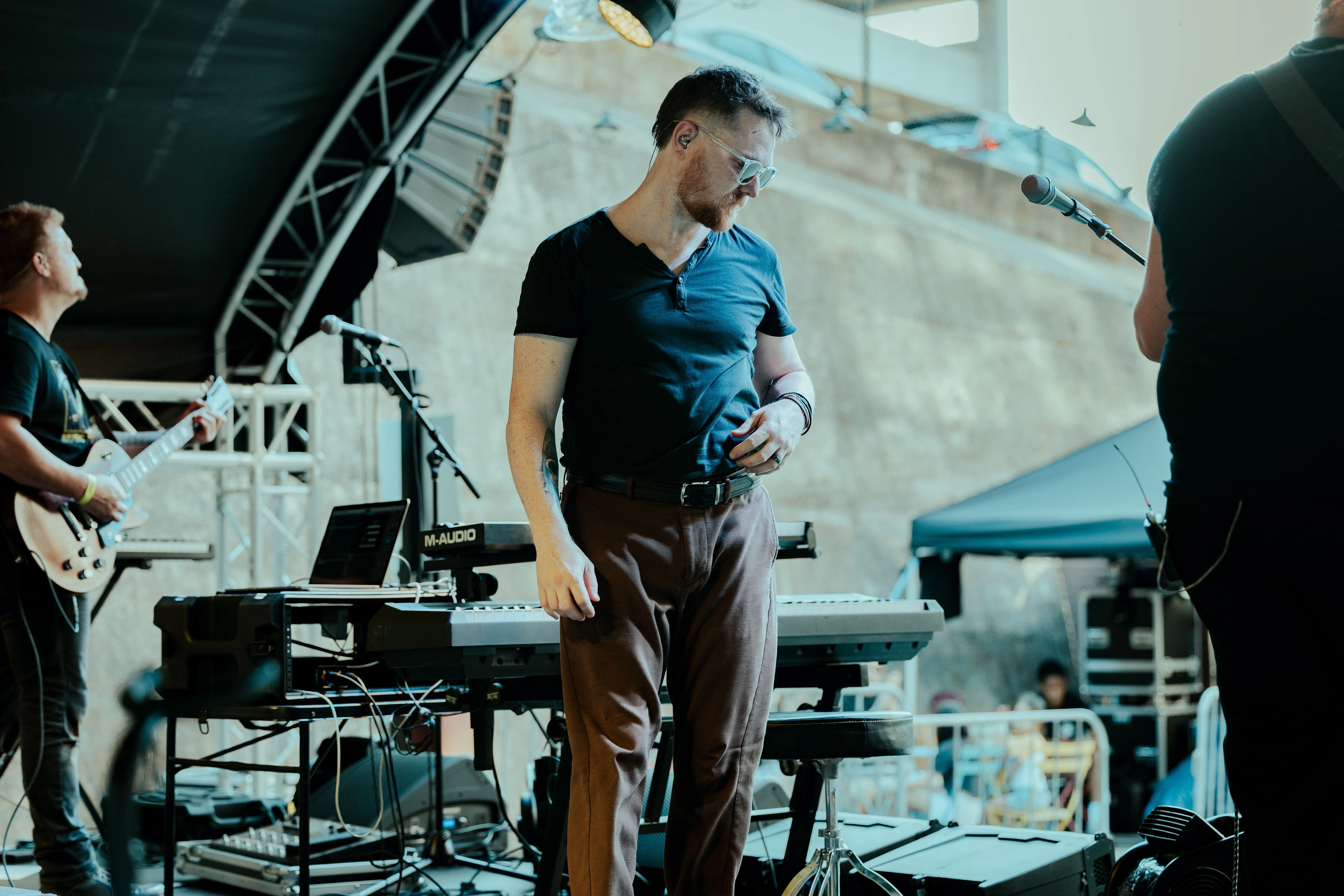 Scott preparing on an outdoor stage